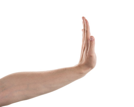 Adult man left hand stop gesture isolated on whiteの写真素材