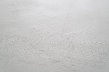 Closeup background of decorative plaster surface for product placementの写真素材