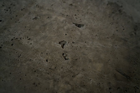 angle closeup shot of rough concrete surfaceの写真素材