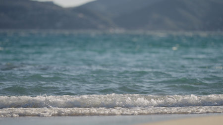 shot of evening waves on Cannes beach before sunset