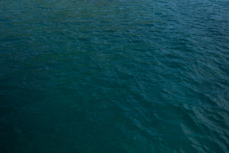 Indian ocean water background in bay on Seychelles islandsの写真素材