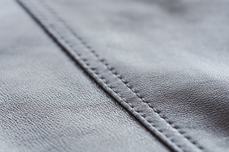 Closeup full grain gray brown leather clothes backgroundの写真素材