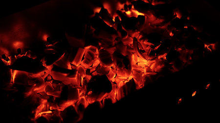 closeup of hot charcoal in dark environment