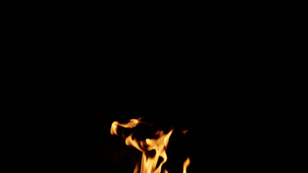 fire flames of campfire over black background, for overlay