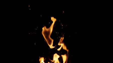 fire flames of campfire over black background, for overlay