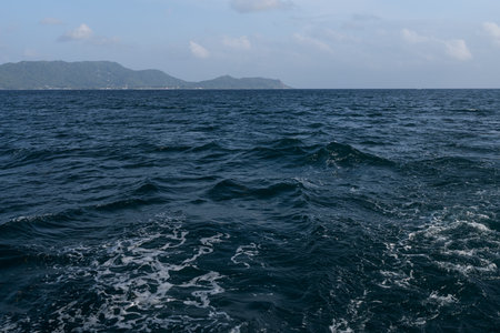 Sailing on a boat around Seychelles island in Januaryの写真素材