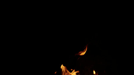 fire flames of campfire over black background, for overlayの写真素材