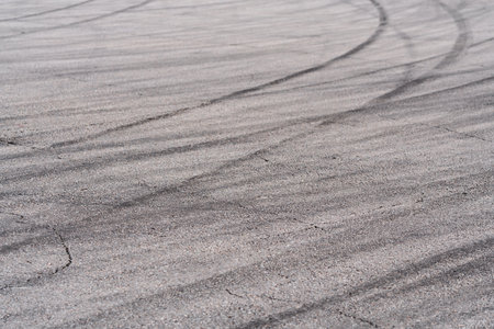 Asphalt with black rubber marks from tyresの写真素材