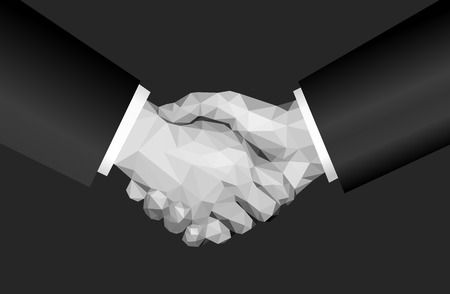polygonal hand handshake business style jacket sleeve on darkの写真素材