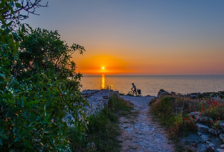 Cyclist at sunset  Sunset, Sevastopol,Crimeaの写真素材