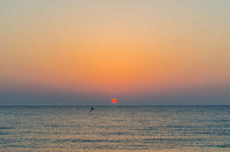 Dawn on the beach の写真素材