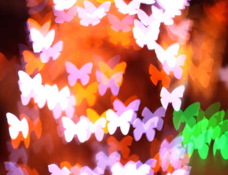 Abstract colorful bokeh background image caused by shooting out of focus of light at nightの写真素材