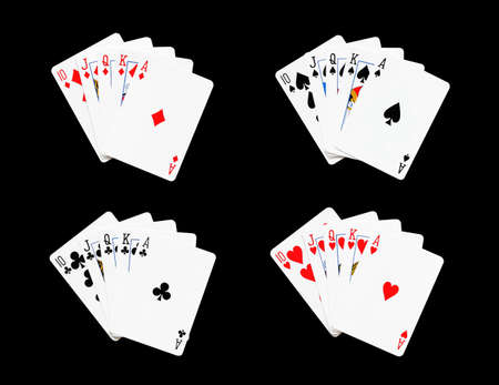 Royal Flush of spade,heart,diamonds,clubs in poker game on a black background