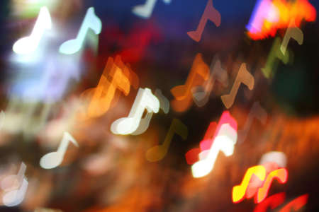 Multicolour bokeh musical notes shape ,the art from night lightsの写真素材