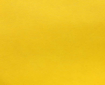 Texture background of yellow leather for your work