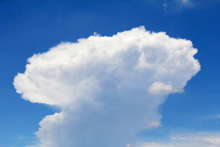 Sky background with the fluffy white cloudsの写真素材