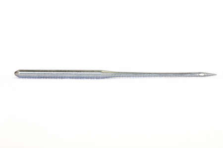 Sewing machine needle on a white backgroundの写真素材