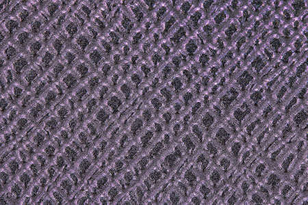 Texture background of close up photography purple pvc vinyl,unfocused