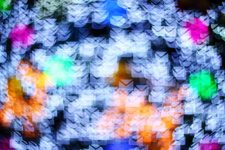 Abstract colorful bokeh background image caused by shooting out of focus of light at nightの写真素材