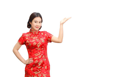 Asian woman in cheongsam dress(qipao), The national dress of Chinese people isolated on white background, Happy chinese new year.の写真素材