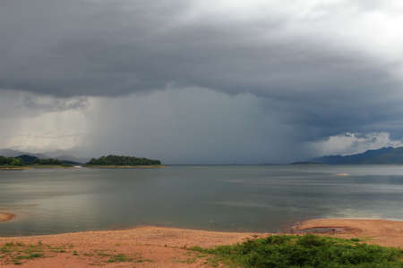 Abstract background of nature and arcus cloud (shelf cloud) during time the rains at lake and...