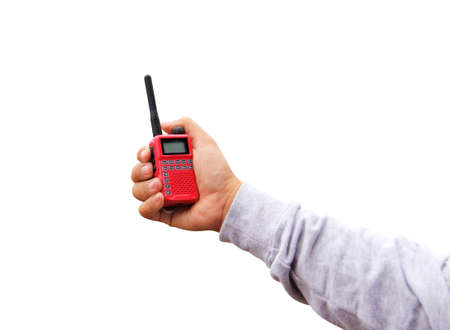 Radio communication(walkie-talkie radio) in hand, isolated on white background with clipping path.の写真素材