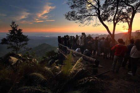 Many tourists watching the sunrise and take photos at view point of