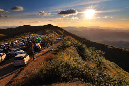 Thailand - December 30,2017 : Many cars of tourists come camping and let's see beautiful of natural and during sunset in long weekend at Nern Chang Suek Mountain, Kanchanaburi province in Thailand.のeditorial素材