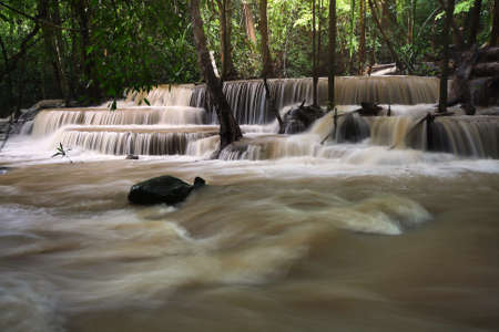 A beautiful view of Huay Mae khamin waterfall at Kanchanaburi province in Thailand. traveling and...