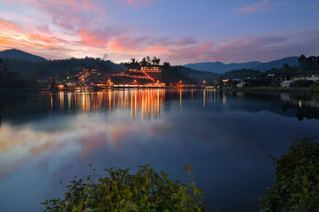 Beautiful scenery during twilight of Yunnan Chinese Village is located on the hill at Ban Rak Thai , Mae Hong Son in Thailand.This is very popular for photographers and tourists.の写真素材