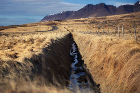 Beautiful scenery of natural from meadow and mountains. Can be seen along the route on Ring road in Iceland.の写真素材