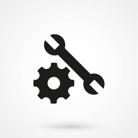 Simple wrench and gear icon, with shadow and white background.のイラスト素材