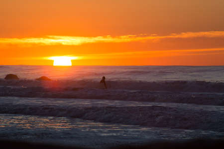 Early morning surf session in Rockaway Beach, Queens, New York. Photographed on October 2015.の写真素材