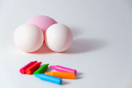 (selec focus) easter eggs and Crayon in white backgroundの写真素材