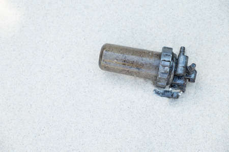 a piece of equipment on white sand at the beachの写真素材