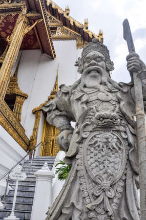 Thai attractions - Old vintage Chinese warrior statue in public Buddhism temple at  Wat Phra Kaew (the temple in grand palace) in Bangkok Thailandのeditorial素材