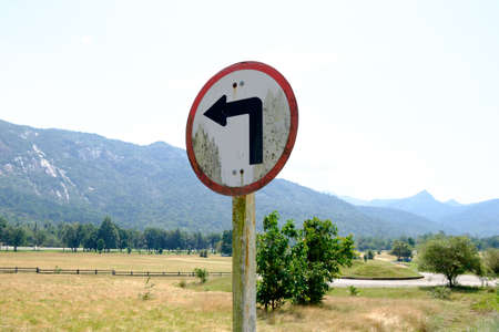 Warning road sign in Thailand ,Turn left,Traffic signs symbols