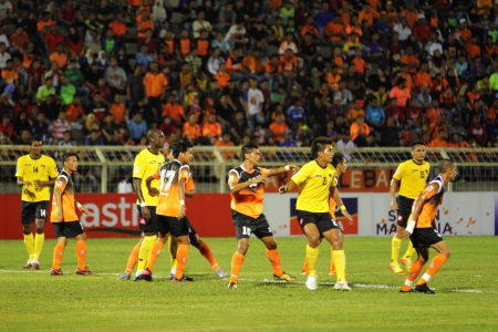 JOHOR BAHRU - JANUARY 14 ; Players during a Malaysian Super League match between Johor FC and Negeri Sembilan at JCorp Stadium in Pasir Gudang on January 14th 2012  のeditorial素材