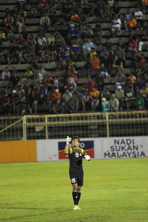 JOHOR BAHRU - JANUARY 14 ; Negeri Sembilan goalkeeper Farizal Marlias celebrates a goal during a Malaysian Super League match between Johor FC and Negeri Sembilan at JCorp Stadium in Pasir Gudang on January 14th 2012  のeditorial素材