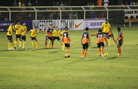 JOHOR BAHRU - JANUARY 14 ; Johor FC player taking a freekick during a Malaysian Super League match between Johor FC and Negeri Sembilan at JCorp Stadium in Pasir Gudang on January 14th 2012  のeditorial素材