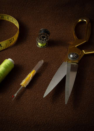 Tailoring materials kept on a brown matte backgroundの写真素材