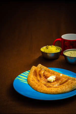 Indian special dosa with butter for a healthy home made breakfastの写真素材