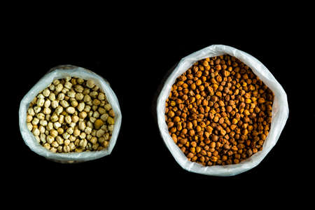 Kabul gram and Bengal gram in two different bagsの写真素材