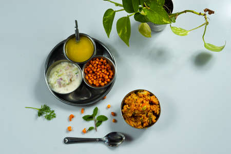Homemade delicious and tasty food with ghee on a white backgroundの写真素材