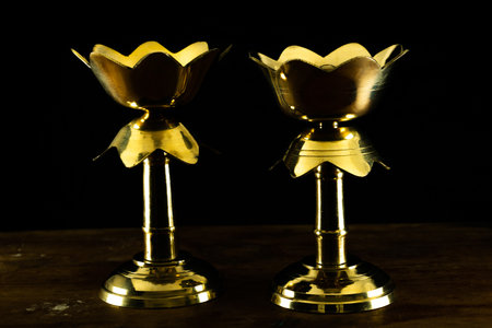 A pair of lamps on the table with selective focus on a wooden tableの写真素材