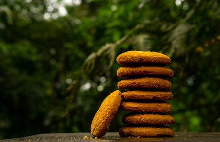 A heap of Sweet cookies stacked together on a tableの写真素材