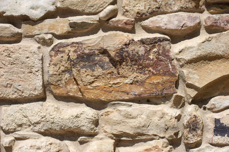 Laying of wild stone, texture of wild stone wall