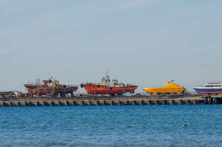 Old fishing boat on the slipway. sea Port in Anapa.