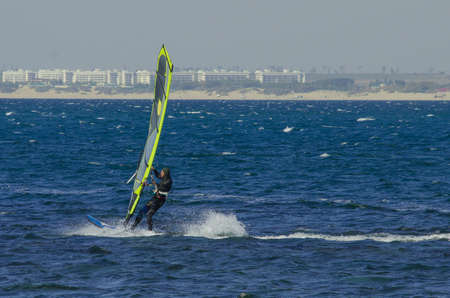 Anapa, Russia-June 15, 2020: Recreational Water Sports. Windsurfing. Windsurfer Surfing The Wind On...