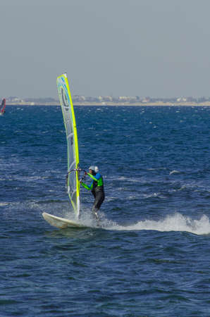 Anapa, Russia-June 15, 2020: Recreational Water Sports. Windsurfing. Windsurfer Surfing The Wind On Waves In Ocean, Sea. Extreme Sport Action. Recreational Sporting Activity. Healthy Lifestyle.のeditorial素材